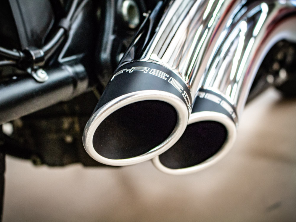 Sharp Curve Radius Exhaust - Chrome with Black End Caps. Fits Softail 2018up. FREEDOM PERFORMANCE EXHAUST - Image 3